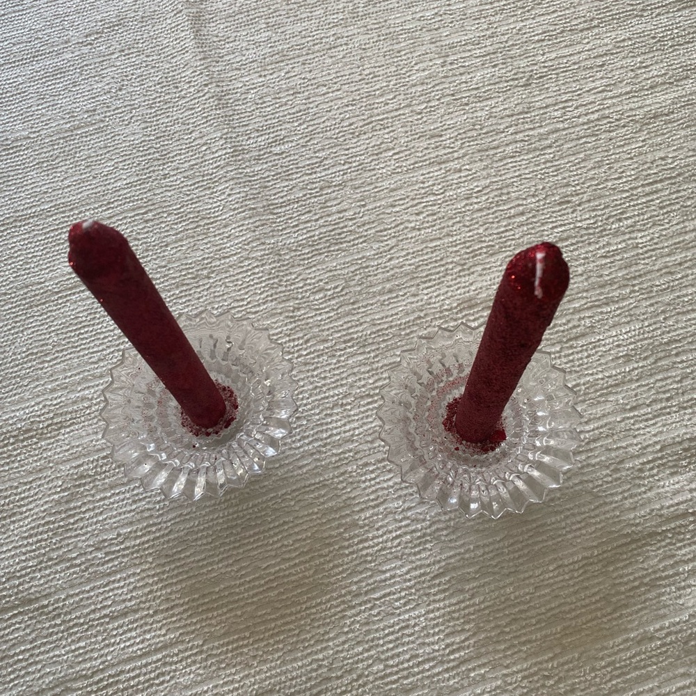 Floral glass taper holders.